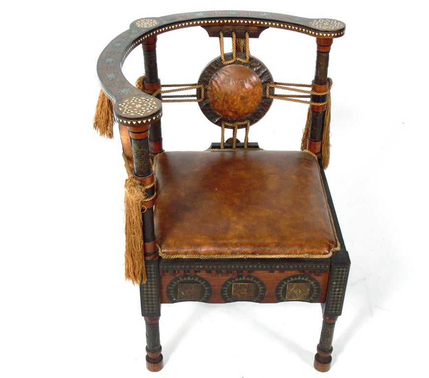 Carlo Bugatti Chair, Italian, circa 1900's. Bugatti's hand made works exhibit influences from the exotic design of Morocco. A similar model of this chair was exhibited at the Turin Exposition in 1898 and the Cleveland Museum of Art in 1999.
