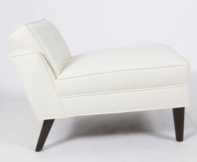 Low Slung California Modern Slipper Chair, circa 1950's. Similar forms were used by Paul Laszlo, Billy Baldwin and Van Keppel and Green in 1950's California interiors. Excellent condition. Completely restored. Reupholstered in an ivory color boucle