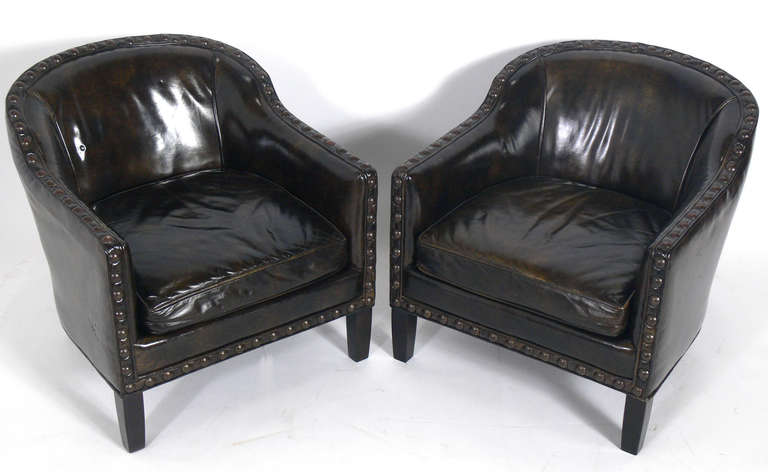 Pair of Low-Slung Petite Lounge Chairs in Original Tortoise Leather with Brass Nailhead Trim