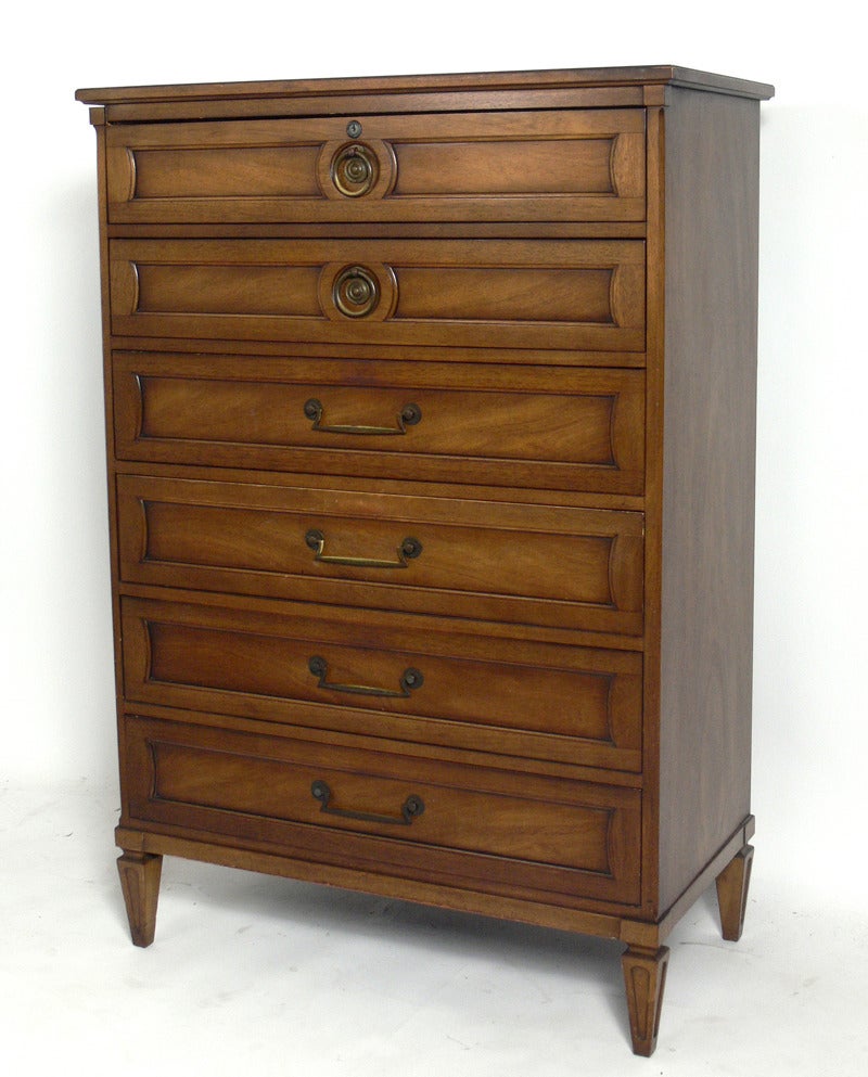 Regency Tall Chest or Dresser, by Henredon, American, circa 1960's. This piece is a versatile size, and can be used as a chest or dresser. It is currently being refinished and can be completed in your choice of color. It would look great in a solid