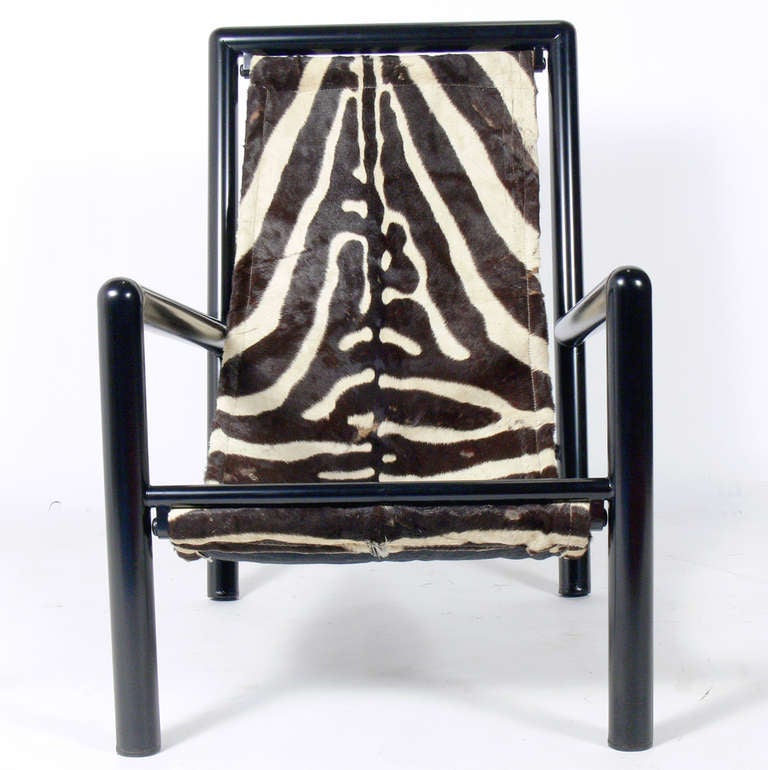 Robert Mallet-Stevens Zebra Sling Lounge Chair, French, after a 1927 design, this example is probably circa 1980's. It is in excellent condition and has been refinished and reupholstered.

Blanket wrap shipping of this piece to most New York City