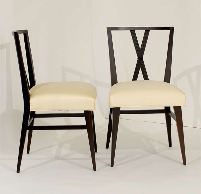 Mid-20th Century Set of Twelve Dining Chairs designed by Tommi Parzinger