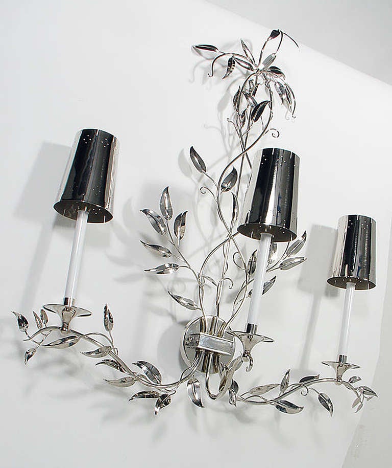 Pair of Glamorous Large Scale Nickel Sconces, American, circa 1940's. Extremely high quality, with finely detailed leaf motif and metal shades. These sconces have been completely restored. They are replated in nickel, and are rewired and ready to