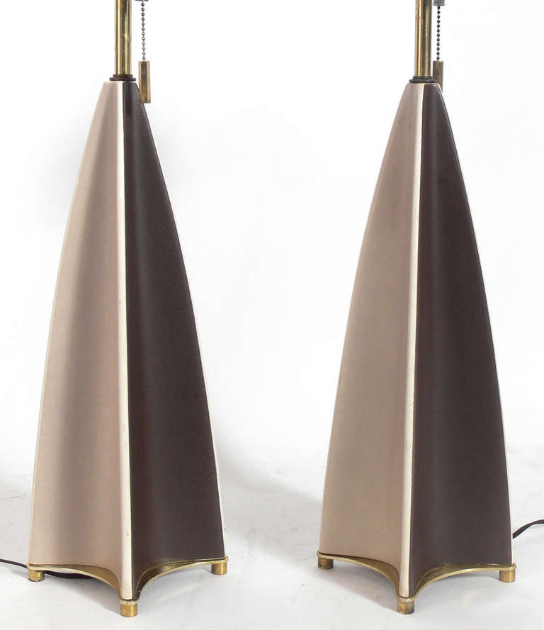 Pair of Sculptural Ceramic Lamps, designed by Gerald Thurston for Lightolier, circa 1950's. Sculptural modernist forms in alternating shades of chocolate brown and tan. The price noted below is for the pair of lamps and shades.