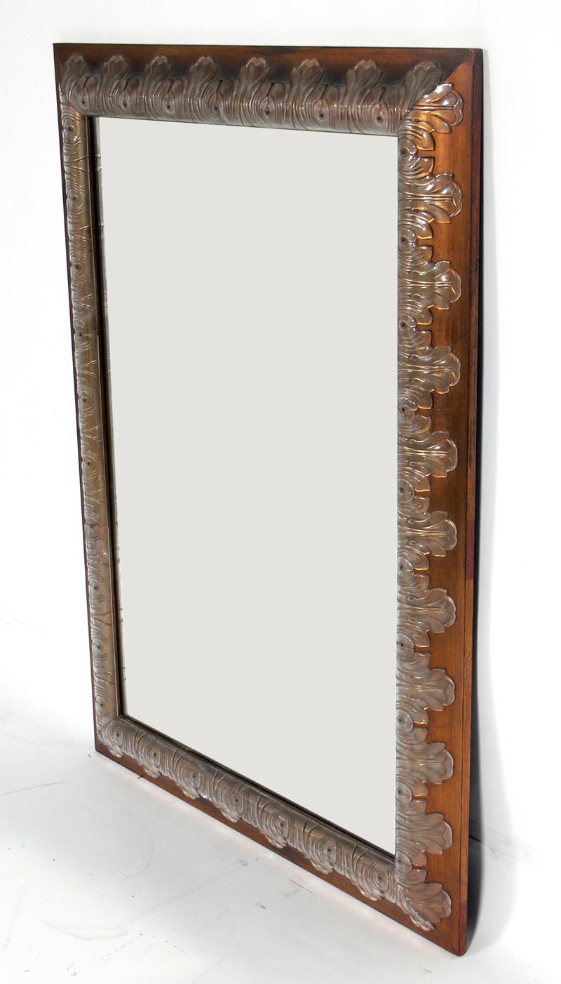Glamorous Lucite and Gilt Wood Mirror, designed for Grosfeld House, American, circa 1940's. Signed with Grosfeld House label on reverse.