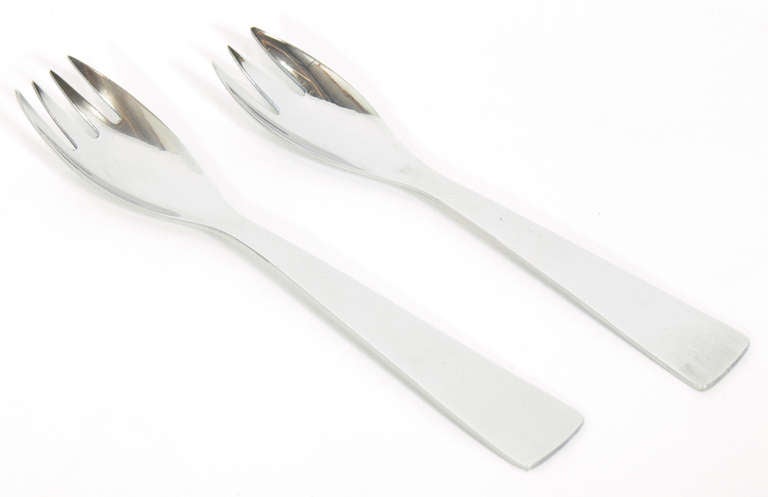 Modernist Flatware Set, designed by Gio Ponti for Arthur Krupp of Italy, and imported by Fraser's, circa 1954. This is a five piece service for twelve people, 60 pieces total. It is constructed of high quality stainless steel and is safe for