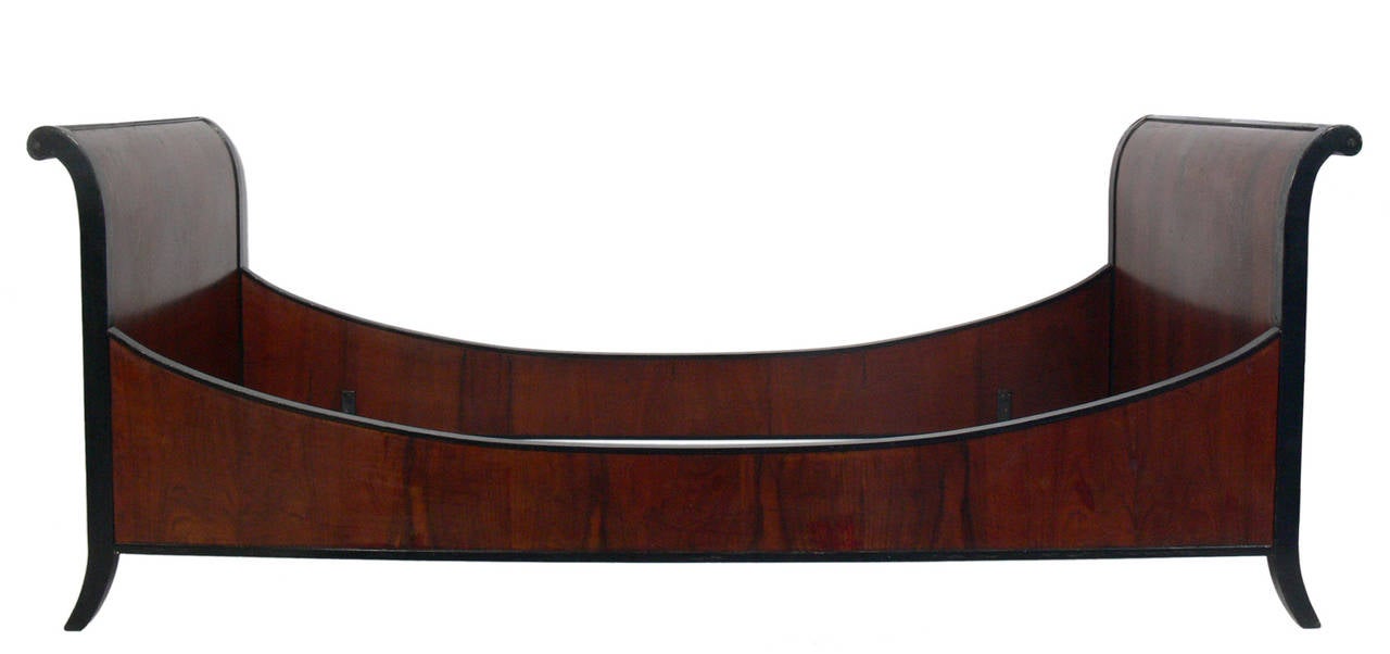 Mahogany Sleigh Daybed, American, circa 1940's. This piece is a versatile size and can be used as a daybed or full sized bed. It is currently being refinished and can be completed in your choice of finish. The price noted below INCLUDES refinishing.