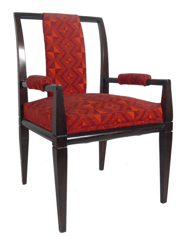 Set of Eight Elegant Dining Chairs, designed by Tommi Parzinger, circa 1950's. These chairs are currently being refinished, and the price noted below INCLUDES refinishing in your choice of color and reupholstery in your fabric. We have several