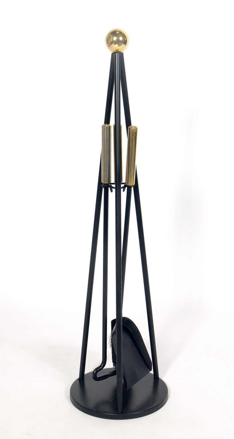 Modernist Set of Black and Brass Fire Tools, American, circa 1950's.