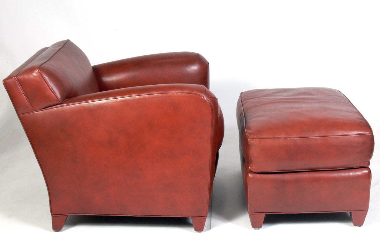 Donghia Cognac Leather Lounge Chair and Ottoman, American, circa 1990's. Comfortable stylish club chair in supple cognac color leather. Measurements for the chair are listed below. The ottoman measures 18