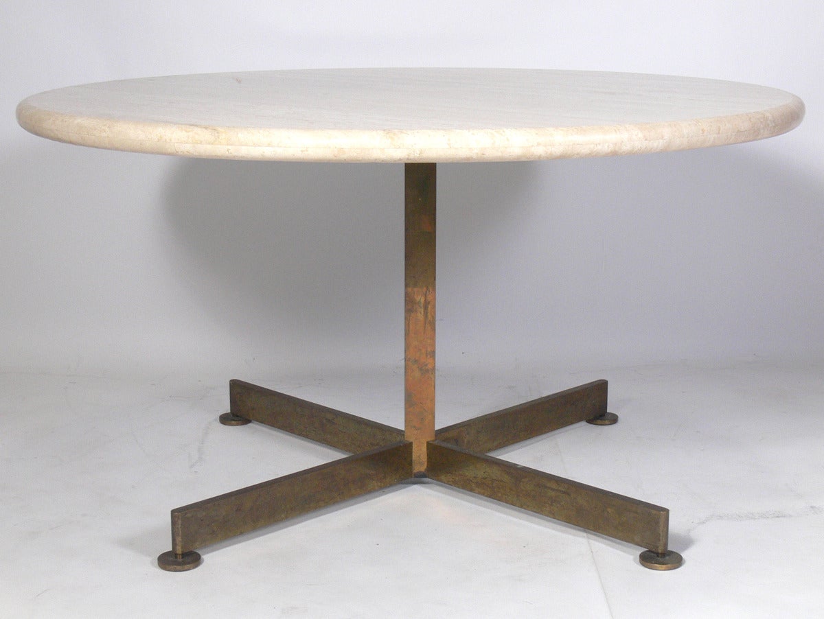 Italian Travertine and Bronze Dining Table, circa 1960's. This table is a low slung design and can be used as a dining or game table. It measures 26