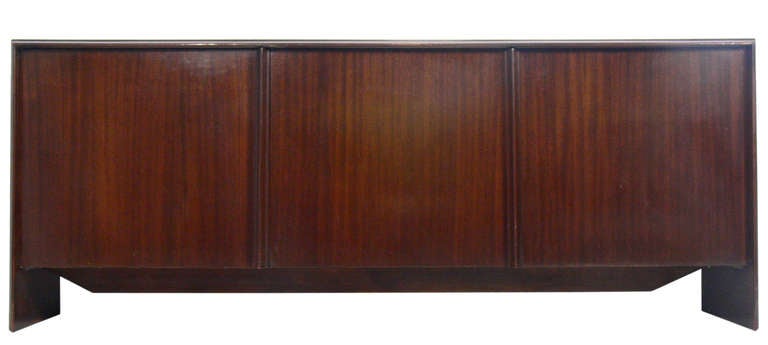 Clean Lined Modern Credenza, designed by T.H. Robsjohn Gibbings for Widdicomb, circa 1950's. This piece is currently being refinished and can be finished in your choice of color. The price noted below INCLUDES refinishing.