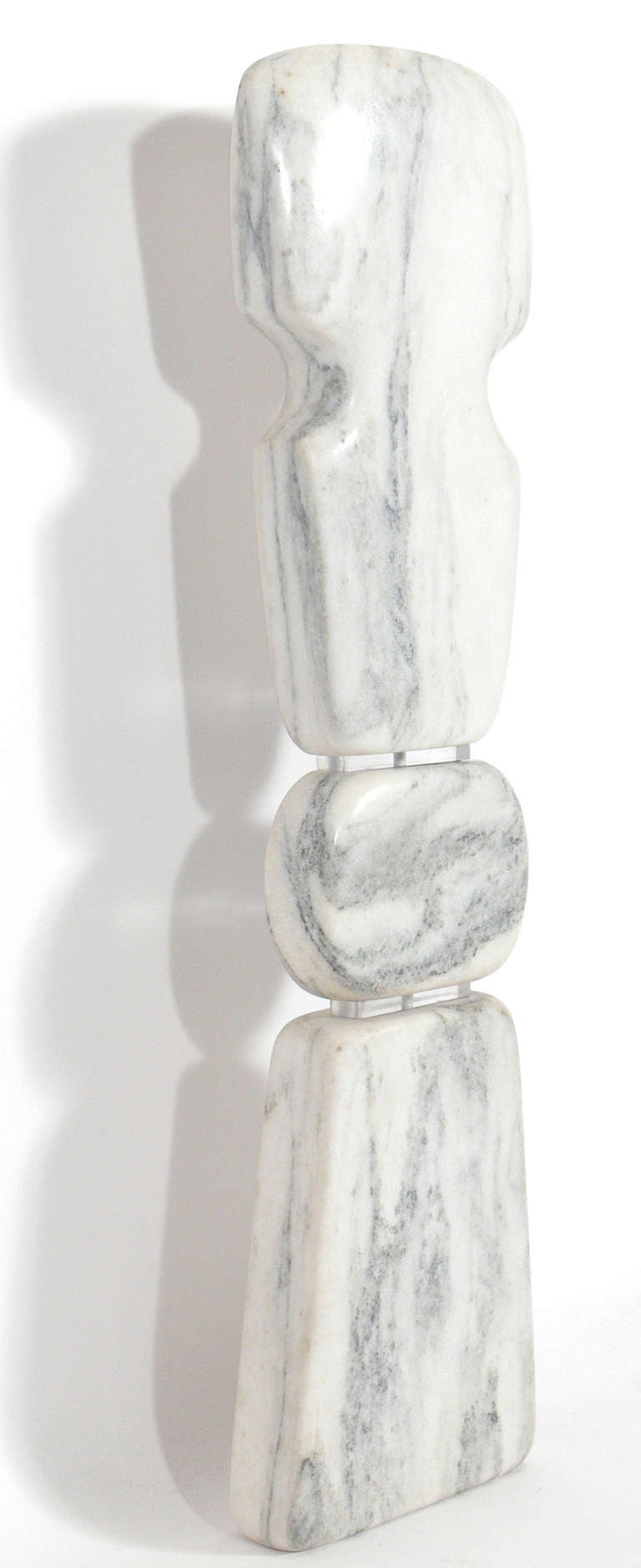 Marble Totem Sculpture, made by Erwin Kalla, circa 1960's. Curvaceous form executed in white marble with gray veining and lucite spacers.