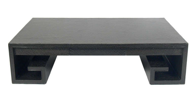 Large Scale Greek Key Coffee Table, designed by Thomas Pheasant for Baker, circa 2000. Clean lined Greek Key or Asian scroll design with unique crackle glaze finish. It has two discreet drawers on each side to hide remote controls or other detritus