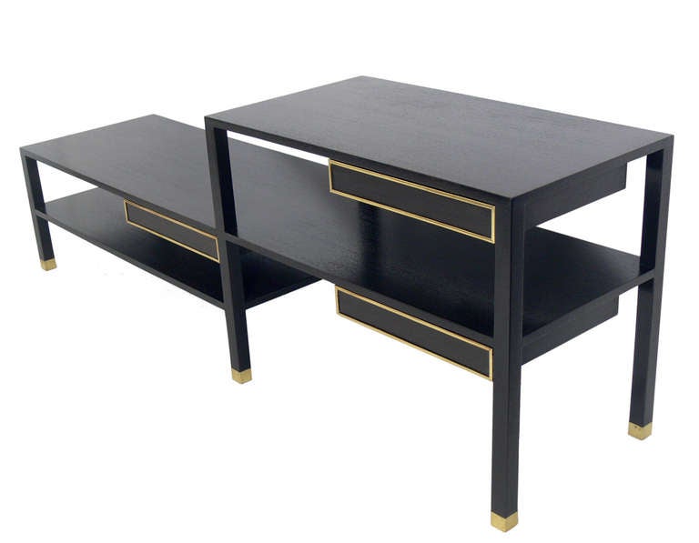 Elegant Modern Console or Sofa Table, designed by Harvey Probber, American, circa 1960's. This piece has been completely restored in an ultra-deep brown lacquer with the brass details hand polished and lacquered.