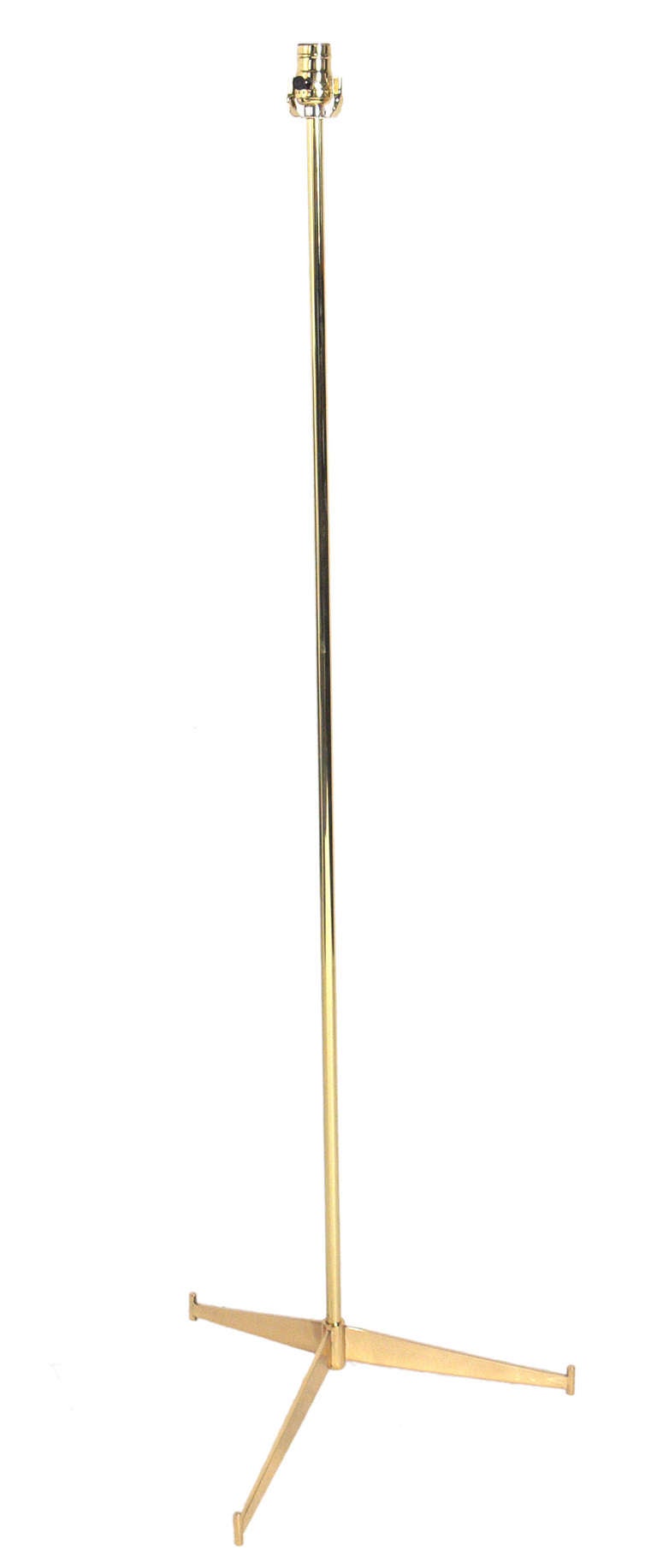 Rare Brass Floor Lamp, designed by Paul McCobb, circa 1950's. Very clean lined modernist design. This example has been polished and lacquered. It is rewired and ready to use. The price in this listing includes the lamp and shade.