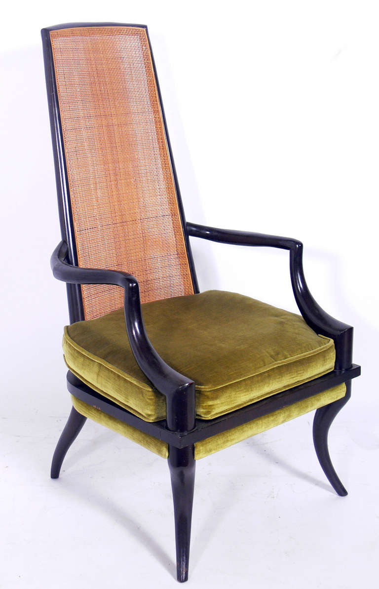 Tall Caned Back Arm Chair with Sculptural Legs, in the manner of Harvey Probber, circa 1960's. The chair is in very good original condition, but should be reupholstered. The price noted below INCLUDES reupholstery in your fabric.