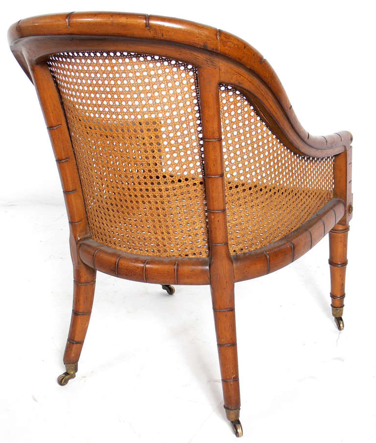 American Curvaceous Caned Faux Bamboo Armchair with Brass Hardware