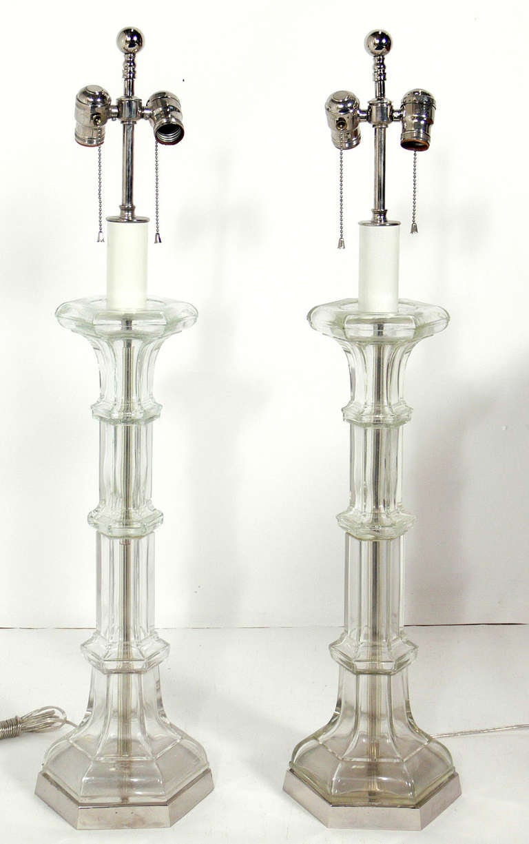 Elegant Pair of Glass and Nickel Lamps, American, circa 1960s. The price noted below includes the lamps and shades. Rewired and ready to use.