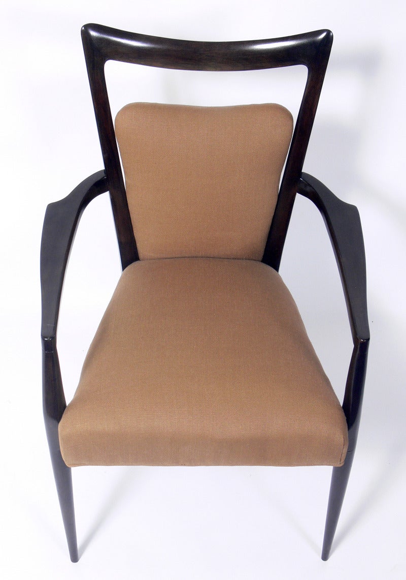 Set of Eight Italian Modern Dining Chairs, designed by Melchiorre Bega, Italian, circa 1950's. These chairs are currently being refinished and reupholstered. The price noted below INCLUDES refinishing in your choice of color and reupholstery in your