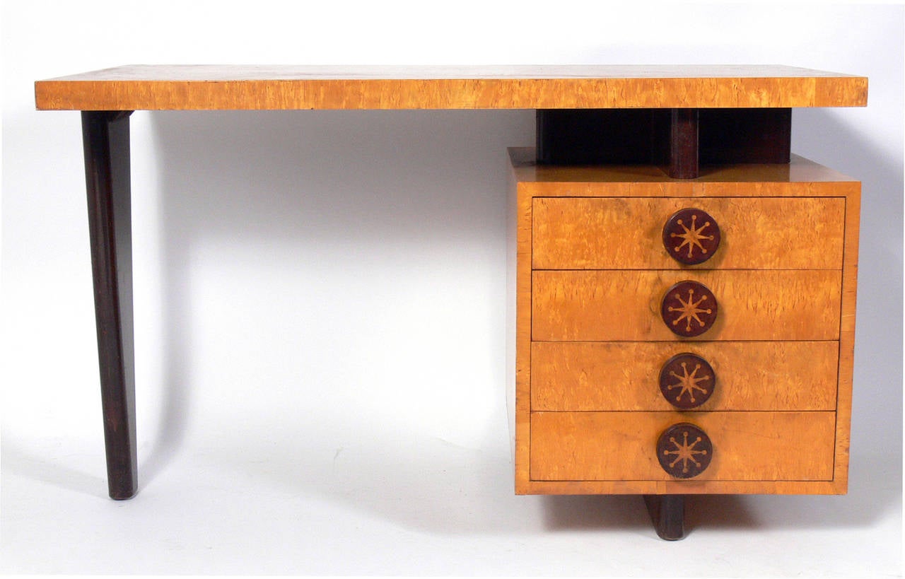 Custom Modernist Desk, hand made by Andrew Szoeke, American, circa 1950's. Outstanding cantilevered design. Signed with original Andrew Szoeke brass medallion. This piece is currently being refinished.