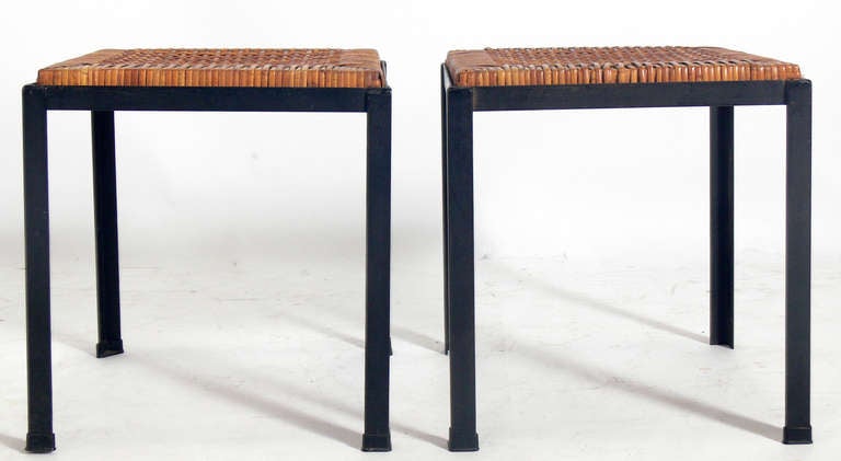 Pair of Iron and Reed California Modern Stools, designed by Danny Ho Fong for TropiCal, circa 1950's. Clean lined modernist stools integrating Asian and California design elements.