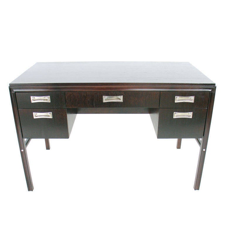 Deep Brown Lacquered Desk with Nickel Plated Hardware, American, circa 1950s. It is tough to find a desk that is just the right size for tight floor plans. This is it! Not too small to be unusable; not too big to take over a room. As it is finished