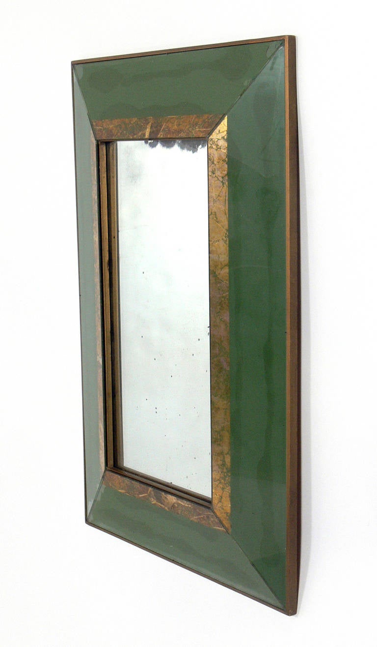 Elegant Green Glass and Gold Leafed Antiqued Mirrors, American, circa 1940's. 
Set of four.
They are priced at $2800 for the set of four, or $800 each.