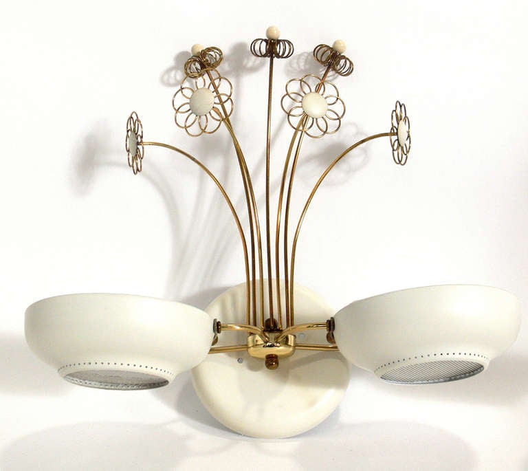 Mid-Century Modern Pair of Elegant Sconces in the manner of Paavo Tynell