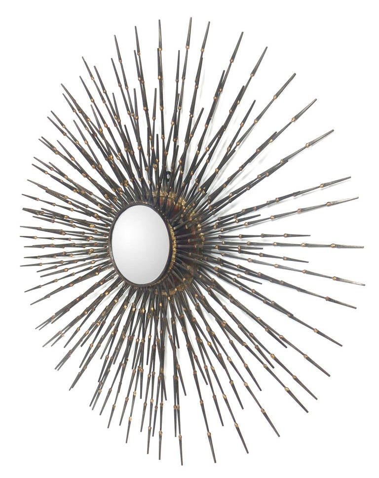 Sculptural Starburst Convex Nail Mirror, American, circa 1960s. Handmade with welded patinated nails. Overall diameter is 32