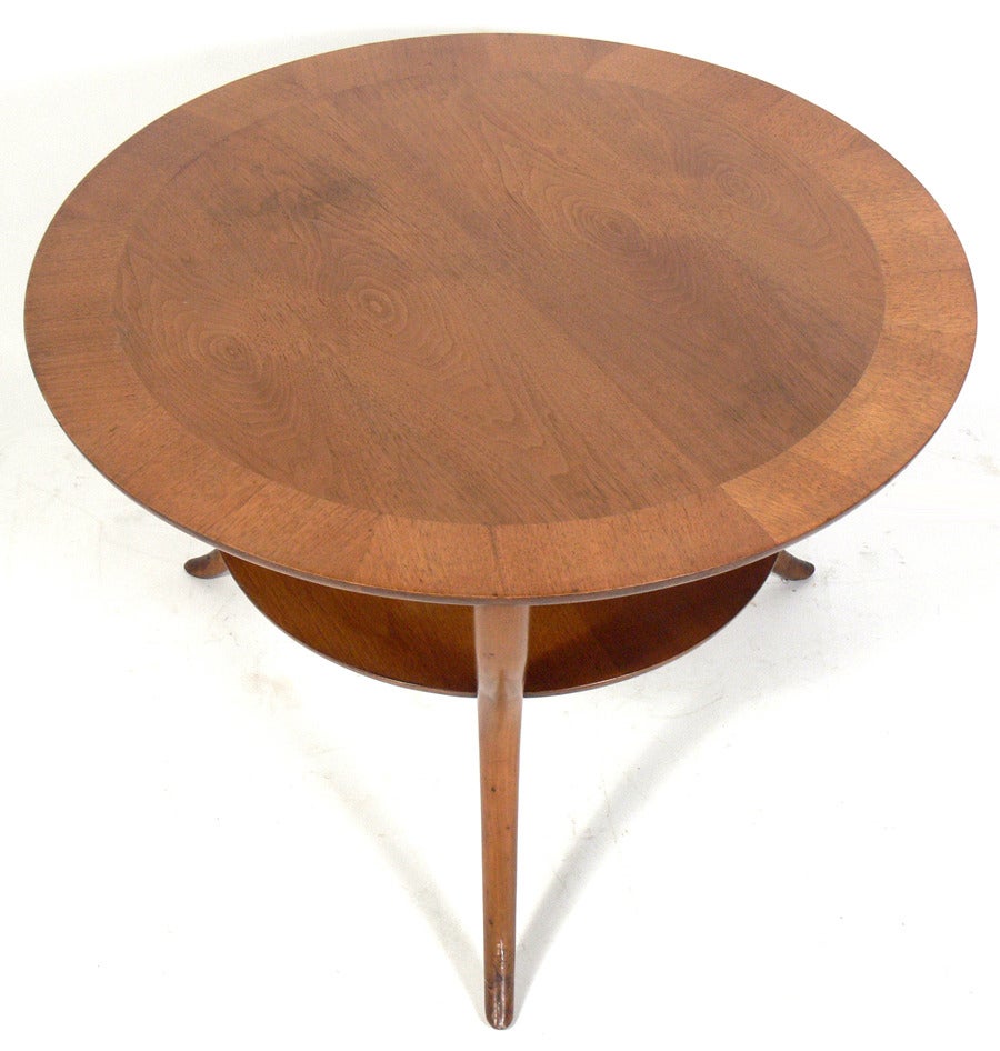 Sculptural Coffee Table, designed by T.H. Robsjohn Gibbings for Widdicomb, circa 1950s. Sculptural splayed leg form and beautiful graining to the walnut. This table is a versatile size and could be used as a coffee table, or as a side or end table.