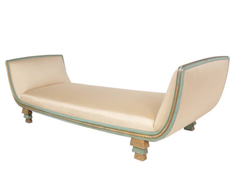 Rare Skyscraper Daybed or Chaise Lounge, designed by Paul Frankl, circa 1930's. Upholstered in an ivory color silk, wooden base finished in it's original green color lacquered and gilt finish.

Blanket wrap shipping of this piece to most New York