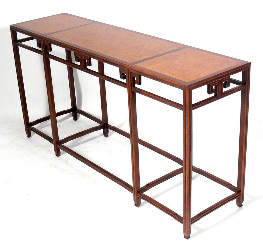 Asian Influenced Console Table, designed for Baker, American, circa 1960's. Beautiful burlwood top and subtle Asian influenced design. This piece is a versatile size and would work well as a console or sofa table, or as a bar.