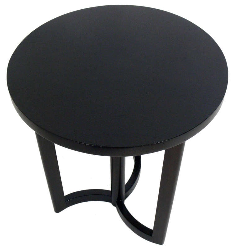 Modernist Propeller Table, in the manner of Samuel Marx, circa 1940's. This table has been refinished in an ultra-deep brown color lacquer. It is a versatile size and can be used as a side or end table, or as a lamp table, pedestal, or night stand.