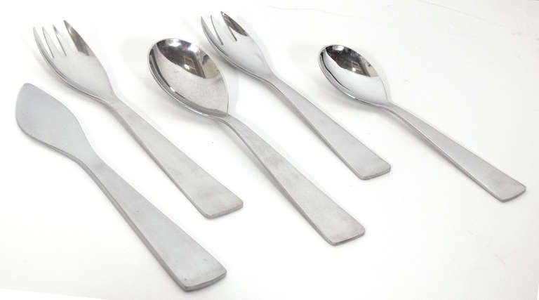 Modernist Flatware Set, designed by Gio Ponti for Krupp and retailed by Fraser's, Italy, circa 1950's.  Each piece is signed. This is a complete vintage set with a five piece place setting for twelve people, and two additional serving spoons. 62