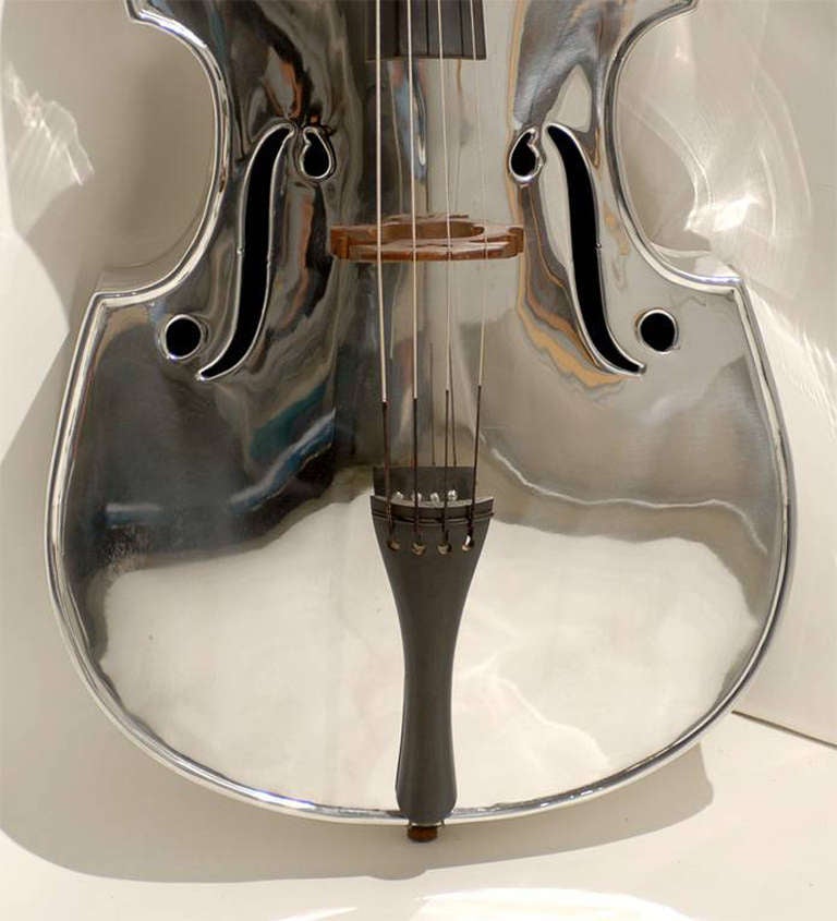 Aluminum Double Bass, designed by John Burdick for the Aluminum Company of America (ALCOA), circa 1930. An incredibly sculptural and emblematic icon of the Machine Age. The all aluminum body of this bass pushed the experimental use of the material.