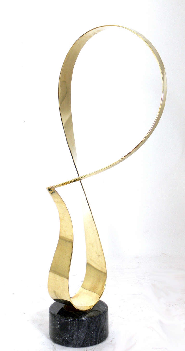 Modernist Brass Sculpture by Curtis Jere, American, circa 1980's. Hand signed and dated at the base of the sculpture. See detail photo.