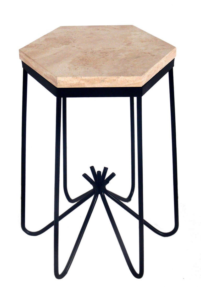 Sculptural Hirondelle Table, in the manner of Jean Royere, early 21st century. This piece is a versatile size and can be used as a side or end table, night stand, occasional table, or pedestal.