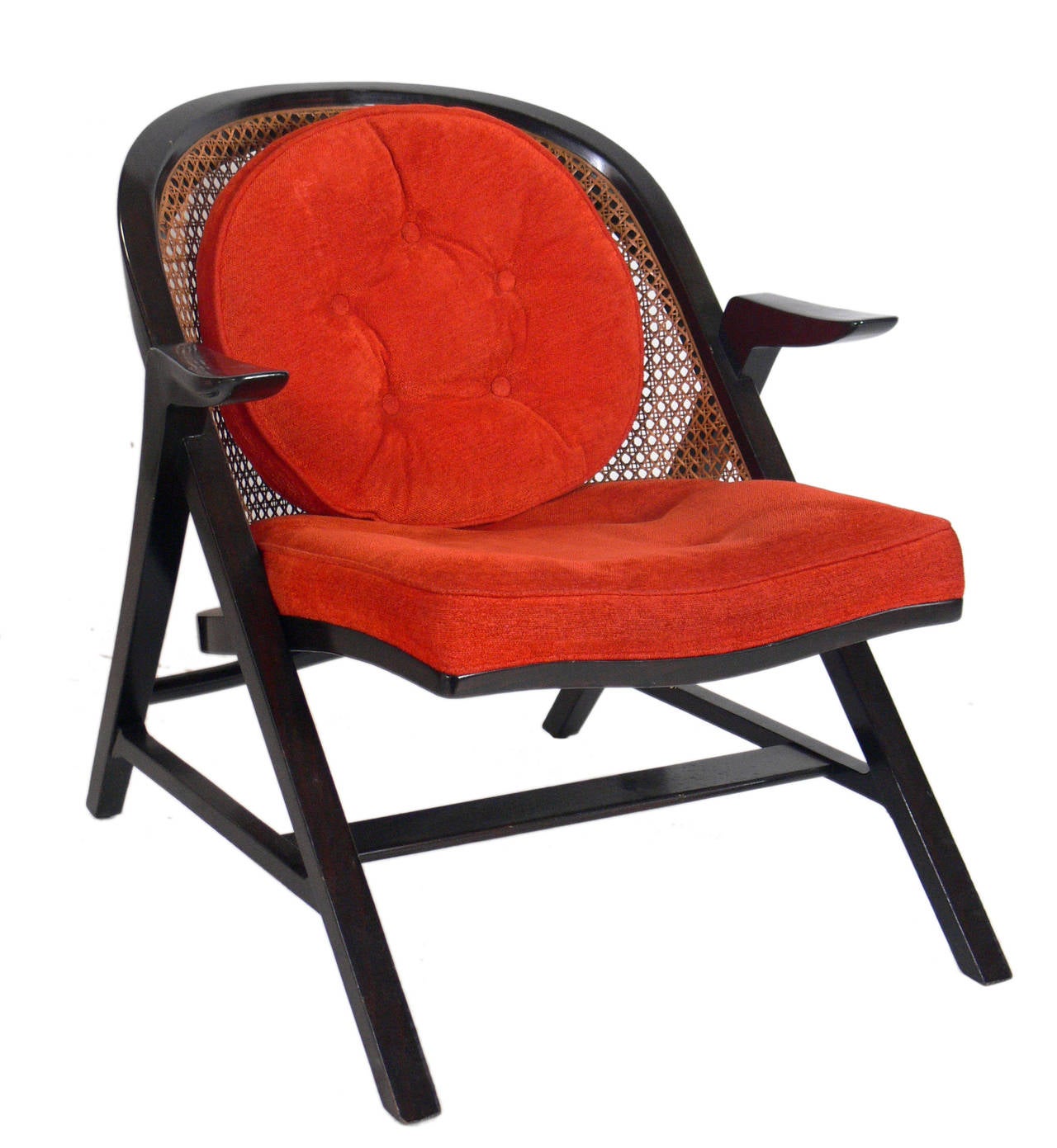 Curvaceous lounge chairs designed by Edward Wormley for Dunbar, circa 1950s. These chairs are currently being refinished and reupholstered and can be refinished in your choice of color and reupholstered in your fabric. The price noted below includes