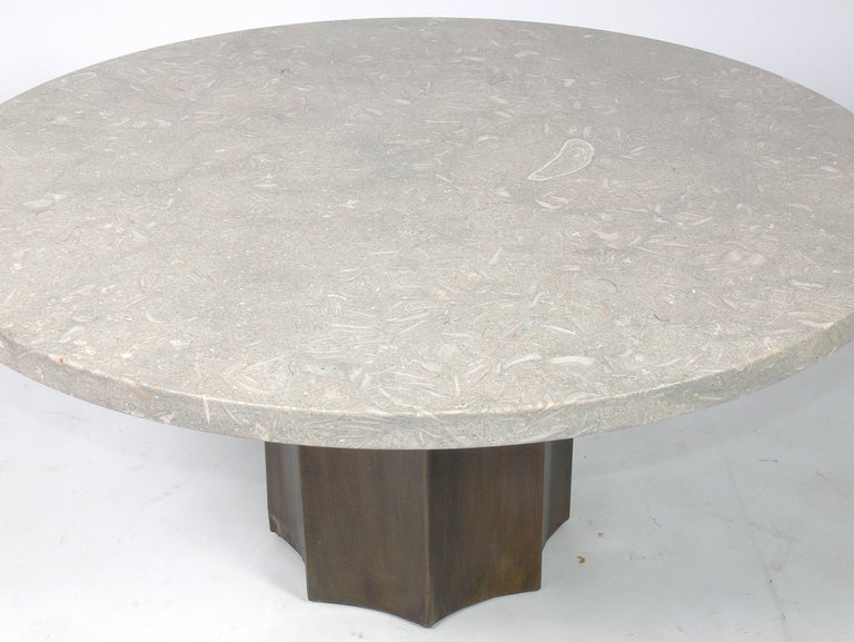 Modern Marble and Brass Coffee Table, attributed to Philip and Kelvin Laverne, circa 1960's. This piece has a beautiful tan and ivory color marble top with inset fossils. The base retains a warm patina to the brass.
