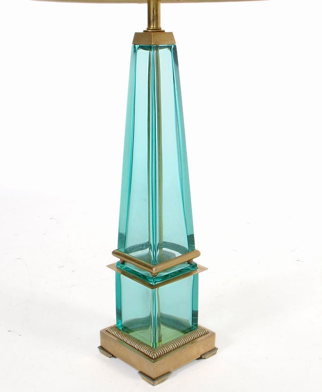 Elegant glass lamp with bronze fittings, made by the Marbro Company, American, circa 1950's. Vibrant blue green color. It is an impressive size, measuring 37.75" height to the top of the shade, and 32" height to the top of the bulb sockets.