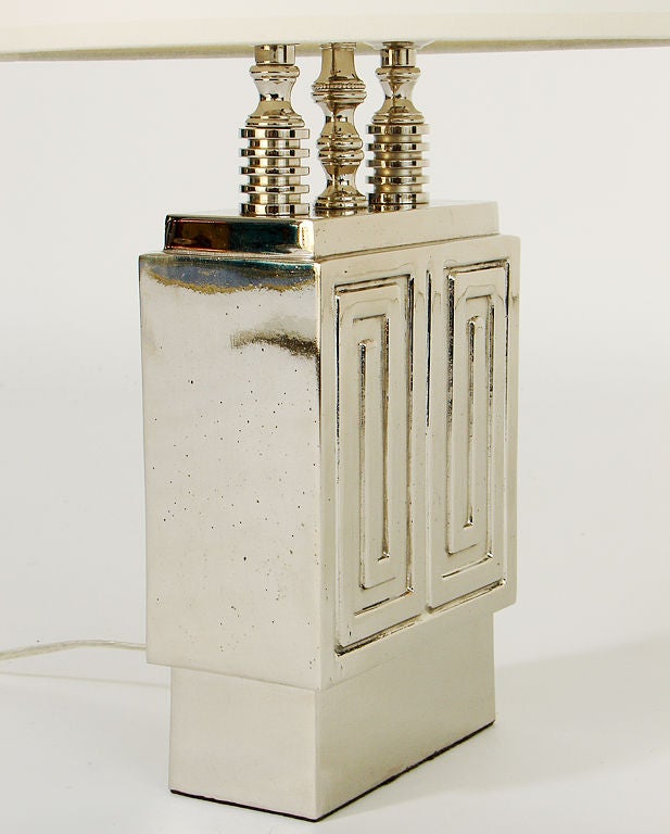 Nickel Plated Greek Key Design Lamp, American, circa 1940's. This piece shows excellent attention to detail, with fine casting and original custom finial. It has been replated and rewired and is ready to go. The lamp measures 24
