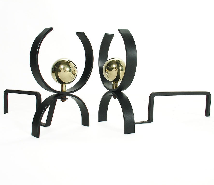 Pair of Modernist "U" Form Andirons, American, circa 1950's. They have been fully restored with the brass hand polished, and the other portions repainted in black enamel.