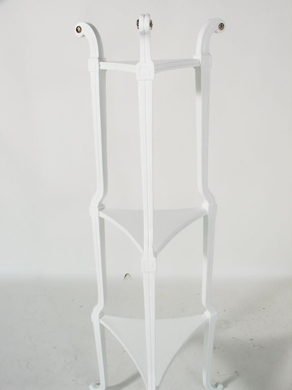 Elegant White Lacquered Plant Stand, in the manner of Tommi Parzinger, circa 1950's. It has been completely restored in a white lacquer finish and nickel plated metal details.