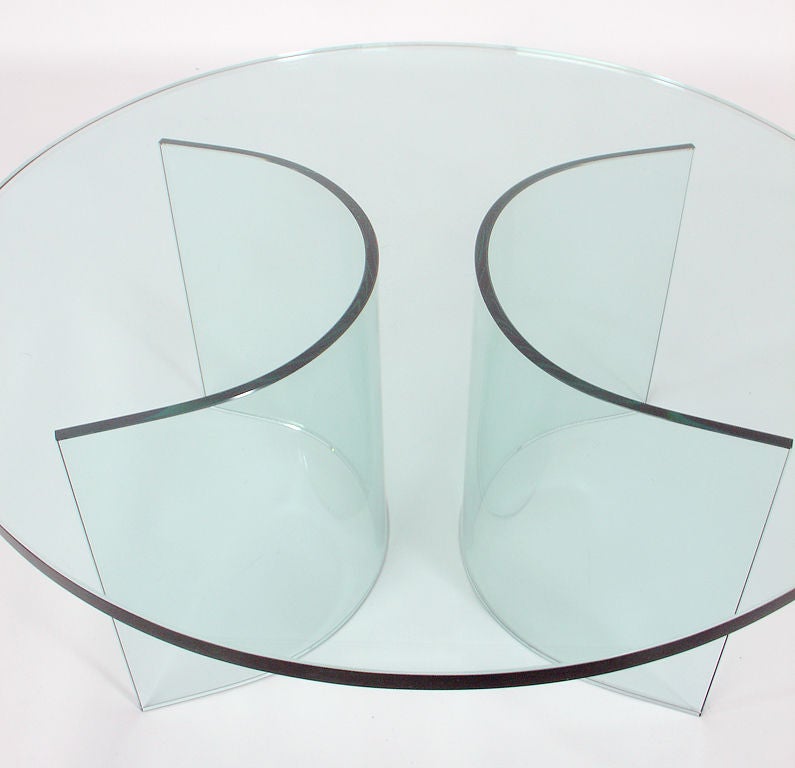 Sculptural Glass Coffee Table Base, Italian, circa 1970's. Solid glass forms the arcs, which can be configured in various ways. This listing is for the two curved arc coffee table bases only. The glass top will be easier and less expensive to get on