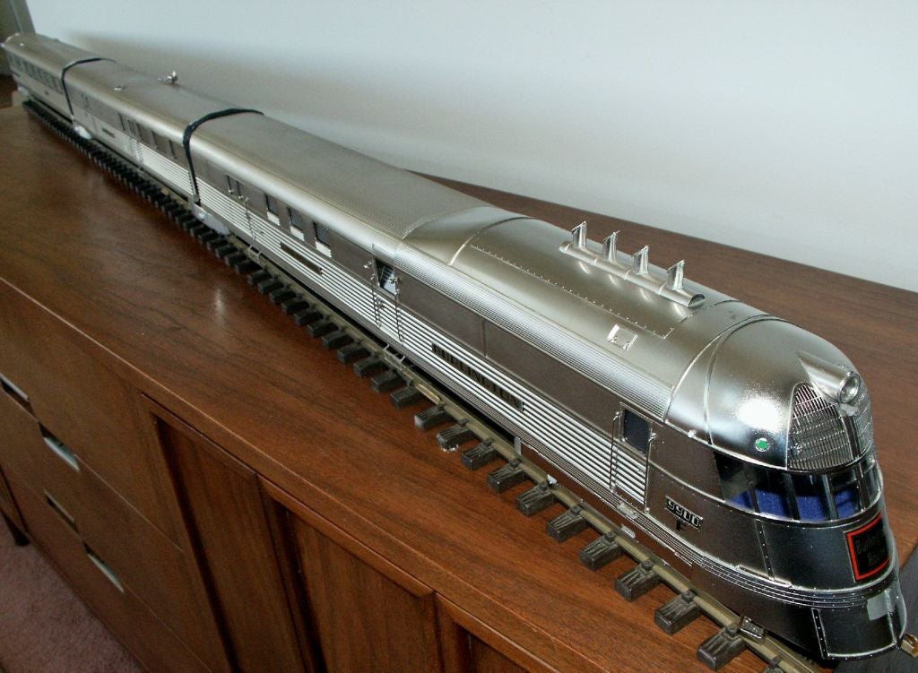 Incredibly detailed model of the Burlington Zephyr.  This model was built to exacting standards, comparable to the manufacturer's own display model.  Made of nickel plated brass in an impressive scale.  The train is equipped with an electric motor