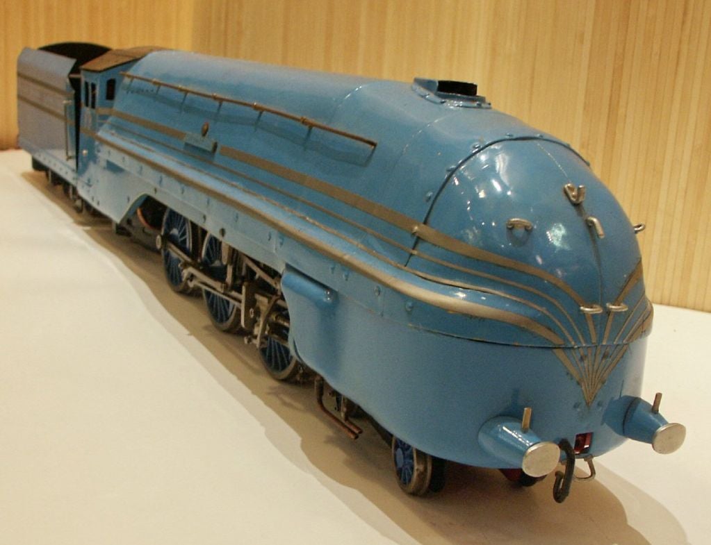 An exceptionally rare one of a kind hand built model of an early Steam Streamliner. This model operates as a real locomotive driven by steam.  The Coronation Scot was an express passenger train of the London, Midland & Scottish Railway inaugurated