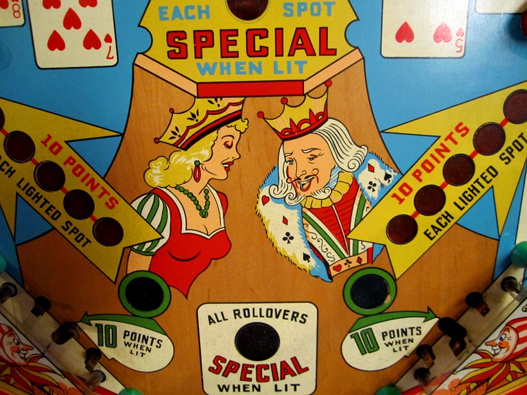 Pinball wall mount, with applied crown accent.