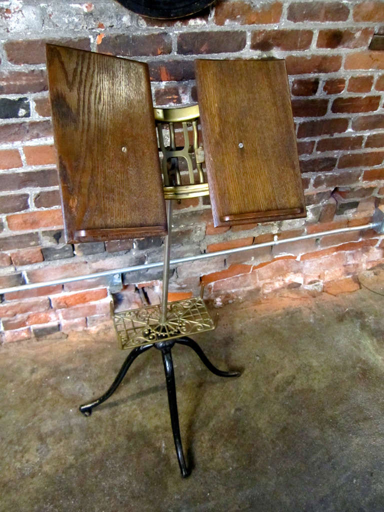 Antique music stand, with oak panels, Base width is 23