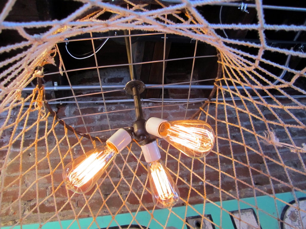 Quirky, fun, and functional, triple socket, crab pot lights.  Use in dining room, beach house, over island, on porch.  Charming.